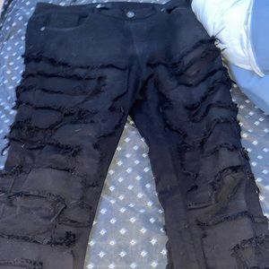 selling stacked pants black